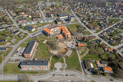 Aerial view on a little town in Europe, Sweden. Low-rise residential buildings and private houses. Landscape architecture, urbanism. Comfortable city for living. Design concept. A little village. 