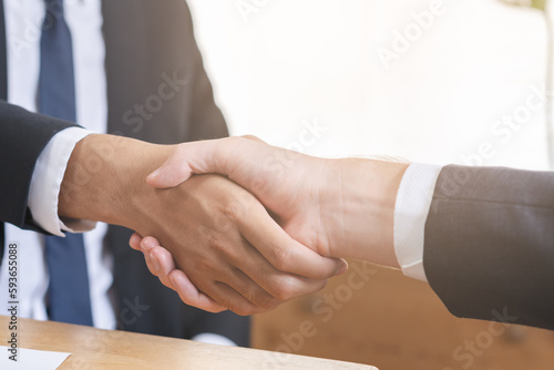 Support, business people, happy asian young man in suit, making handshake, shake hand together with partnership, customer or colleague after is done, successful. Worker meeting, congrats merger.