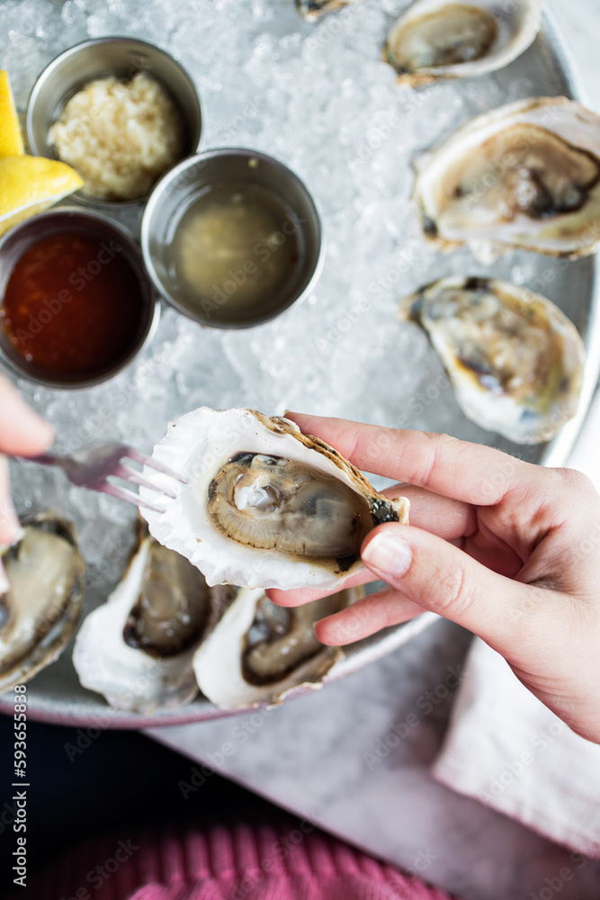 Enjoying Raw Oysters Enjoying Raw Oysters
