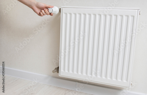 Wallpaper Mural Adjustment of comfortable temperature on the wall radiator in the house. Saving energy resources, increasing the price of gas heating, industry. Copy space for text Torontodigital.ca