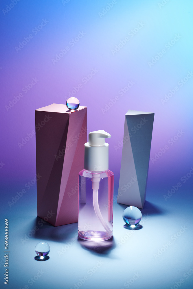 A luxyry bottle of face wash on color background A luxyry bottle of face wash on color background