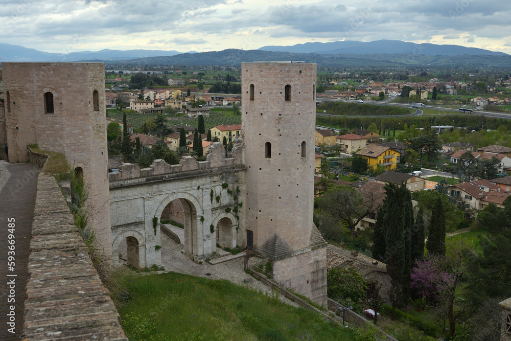 View of Spello medieval village and roman Porta Venere or Venus Gate. Perugia, Umbria, Italy, Europe