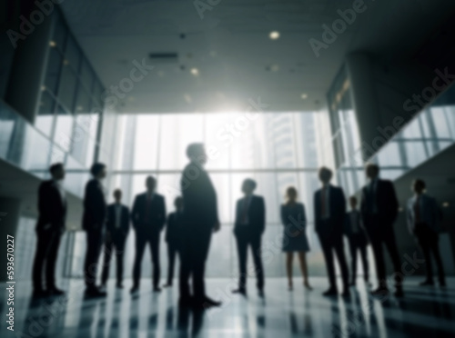 Business team standing in an office blurred background image of a group of corporate employees in the office lobby  young positive diverse coworkers in modern office. wearing suits business people
