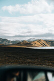 Epic north landscape with snowy mountains and brown desert