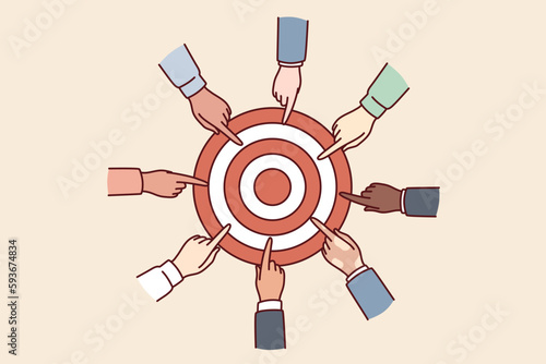 Hands of diverse people near target for concept of collaboration for solving joint task and teamwork in business. Achieving set goals to gain strategic advantages and leadership over competitors 