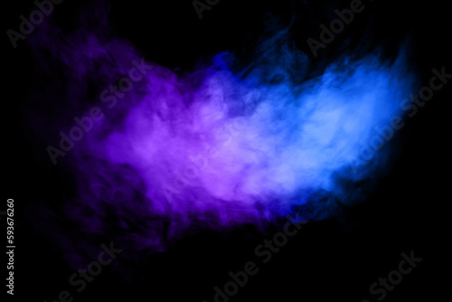 Abstract smoke in various bright colors on a black background.