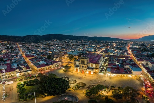 Aerial view of cityscape Jalisco surrounded by buildings in evening