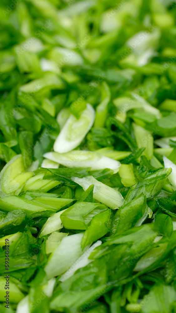 Chopped green onions close up. Seasonal greens for salad Chopped green onions close up. Seasonal greens for salad