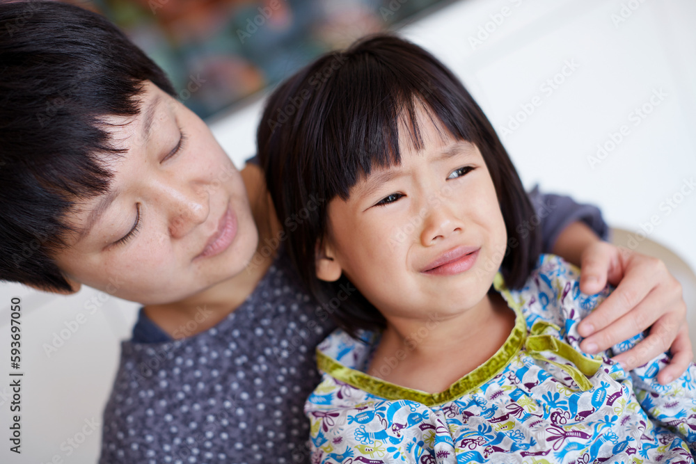 Asian little girl with her mother, tooth extraction in hospital Asian little girl with her mother, tooth extraction in hospital