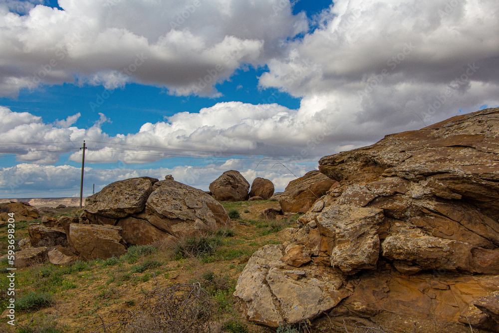 Fototapeta premium rock, landscape, sky, nature, mountain, sea, stone, water, beach, cloud, rocks, travel, clouds, sand, summer, coast, ocean, rocky, hill, bay, desert, outdoors, sun