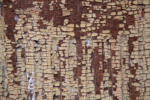 Old wooden cracked painted board, texture closeup photo