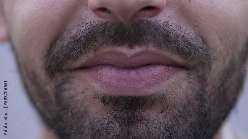 Obraz premium One happy Middle Eastern man mouth closeup smile. Bearded male person macro detail smiling