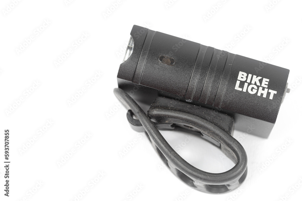 LED bicycle white front light isolated above white background with copy space LED bicycle white front light isolated above white background with copy space