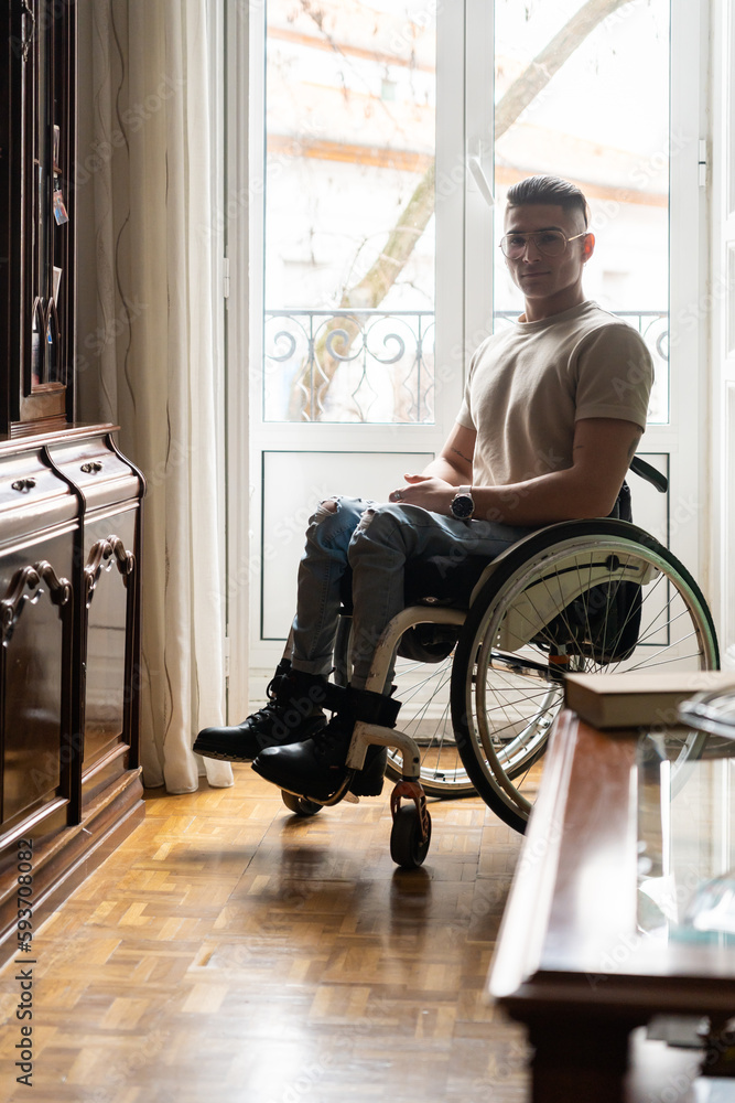Portrait Of Young Man With A Disability At Home Looking At Camera. Portrait Of Young Man With A Disability At Home Looking At Camera.