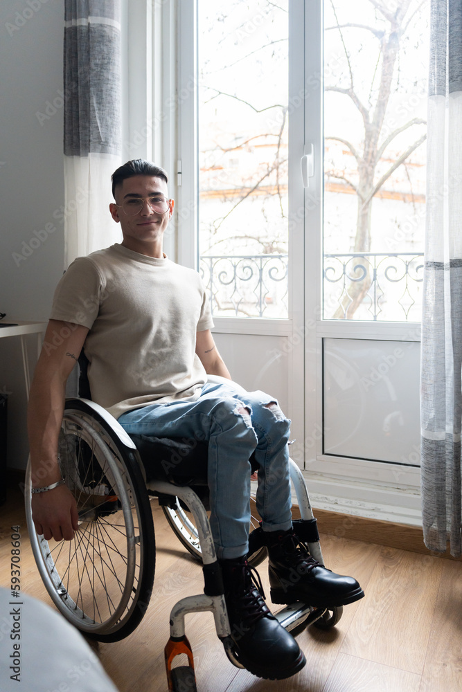 Portrait Of Young Man With A Disability At Home Looking At Camera. Portrait Of Young Man With A Disability At Home Looking At Camera.