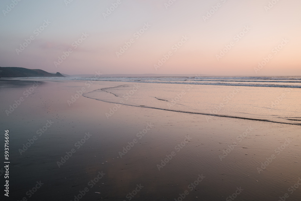 Ethereal pastel late afternoon light on a sandy beach in the UK Ethereal pastel late afternoon light on a sandy beach in the UK