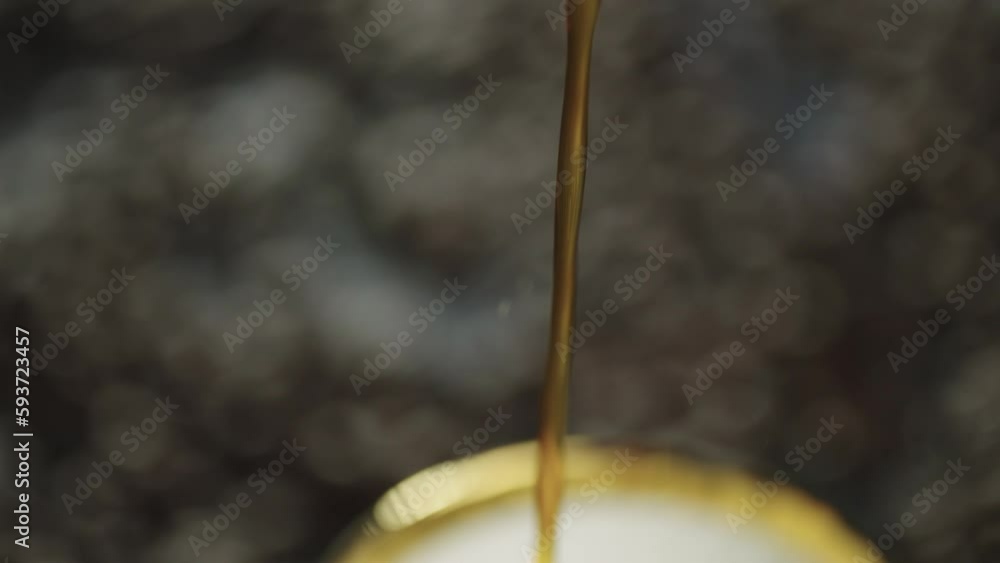 Slow-motion video of pouring coffee into a mug for breakfast at home. Delicious, aromatic coffee steams in the morning. High quality 4k footage Slow-motion video of pouring coffee into a mug for breakfast at home. Delicious, aromatic coffee steams in the morning. High quality 4k footage
