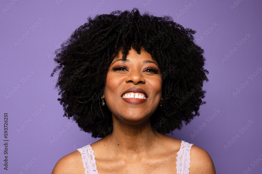Smiling black woman with curly hair Smiling black woman with curly hair