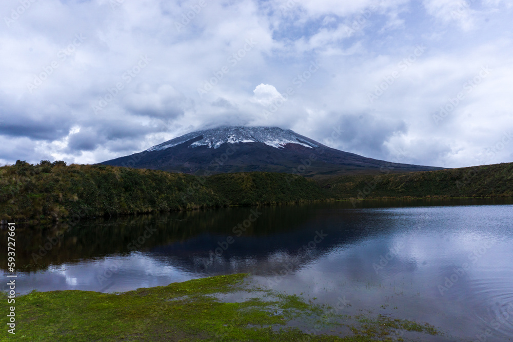 Cotopaxi Volcano and a lake in the mountains