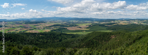 Fototapeta Naklejka Na Ścianę i Meble -  Panoramic view  of mountains seen from top of observation tower on Trojgarb mountain in Walbrzych