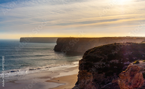 Sunset in the Atlantic Ocean. Cliffs and ocean around the sagres fortress. Coast of Sagres in the Algarve from the Sagres Fortress, Portugual. Portugal landscape, Seascape