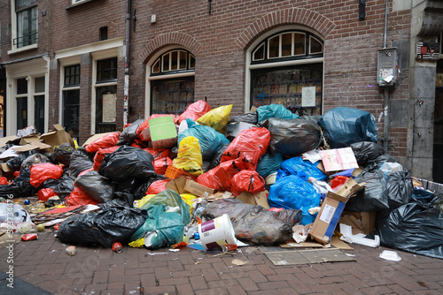 pile of trash on street photo