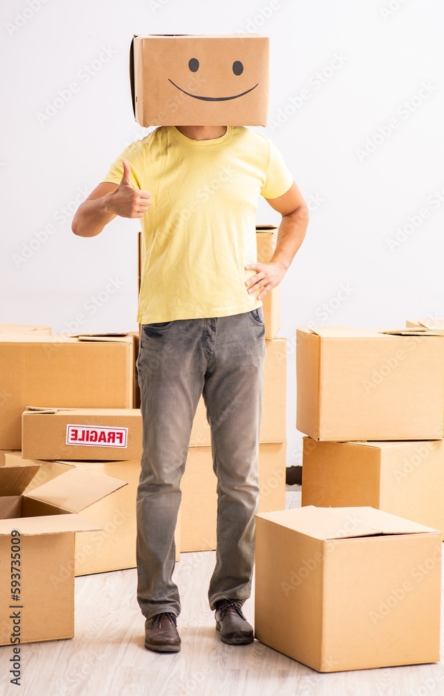 Happy man with box instead of his head Happy man with box instead of his head