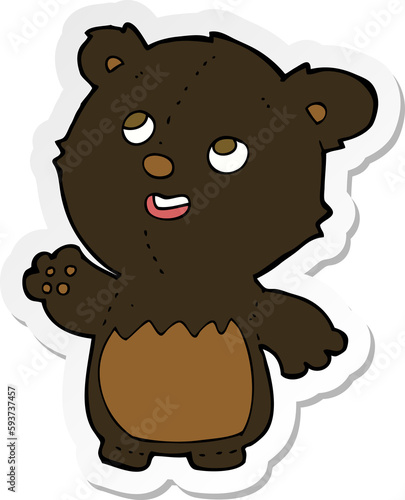 sticker of a cartoon happy little teddy black bear