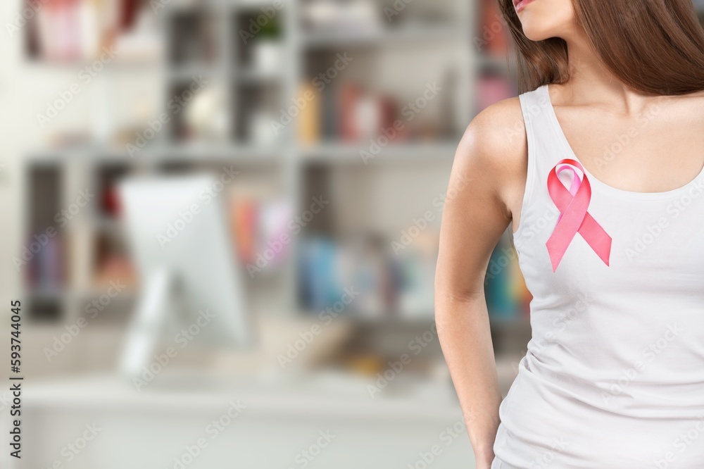 Cancer awareness concept, woman with pink ribbon