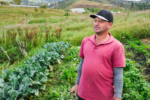 Casual portrait of a farmer in his fields photo