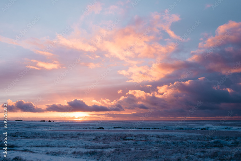 Sunrise over an icy landscape in Iceland Sunrise over an icy landscape in Iceland
