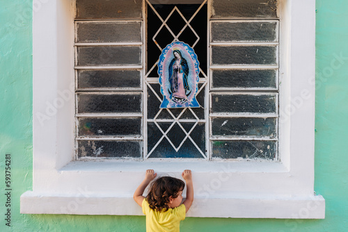 Llittle girl and Virgin of Guadalupe in Mexico trip photo