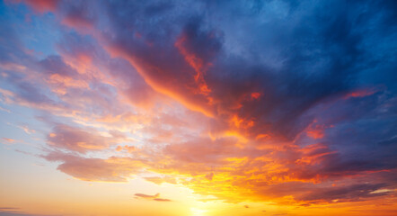 Utterly spectacular sunset with colorful clouds lit by the sun. Bright epic sky.