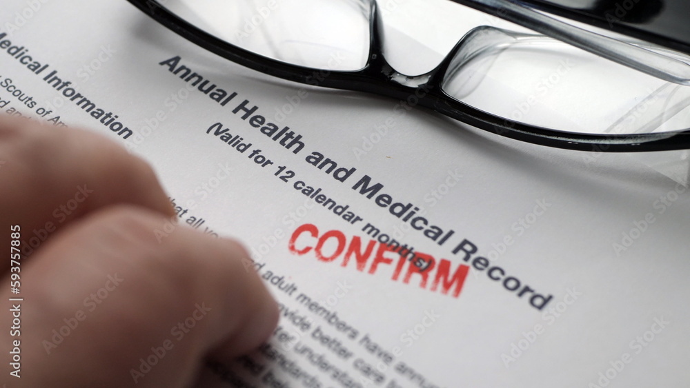 Finger tapping on health and medical report Finger tapping on health and medical report