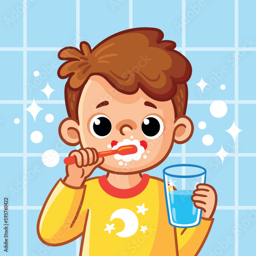 The boy brushes his teeth in the bathroom.