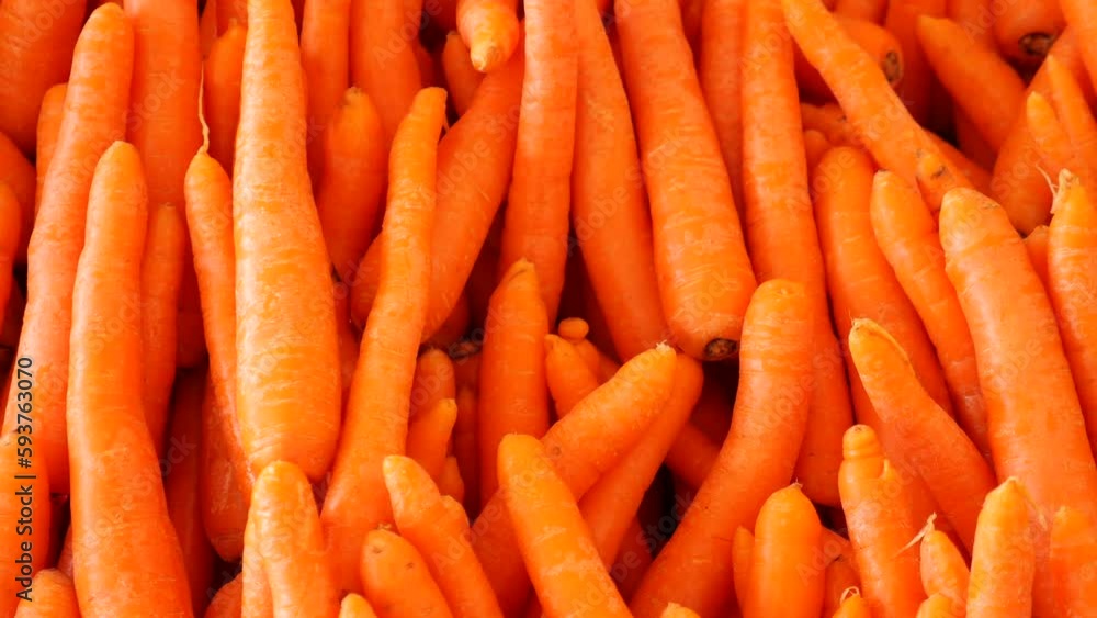 Fresh clean carrots on shelf in farmer market Fresh clean carrots on shelf in farmer market