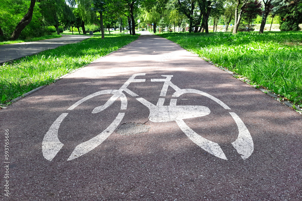 Road markings marking road for cyclists. Image of bike on pavement
