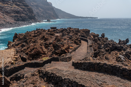 Path of volcanic stones on the coast at Verodal beach on El Hierro Island. Canary Islands photo