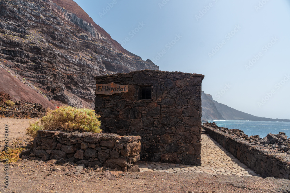 Verodal beach, house of volcanic stones on the coast of El Hierro Island. Canary Islands