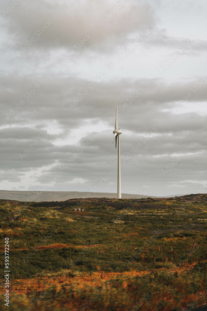 Windmills Close To The mountains, cloudy sky Windmills Close To The mountains, cloudy sky