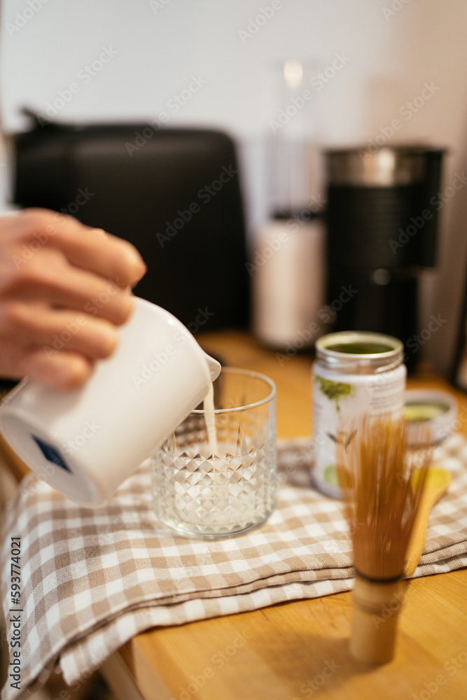 Crop woman preparing matcha at home Crop woman preparing matcha at home
