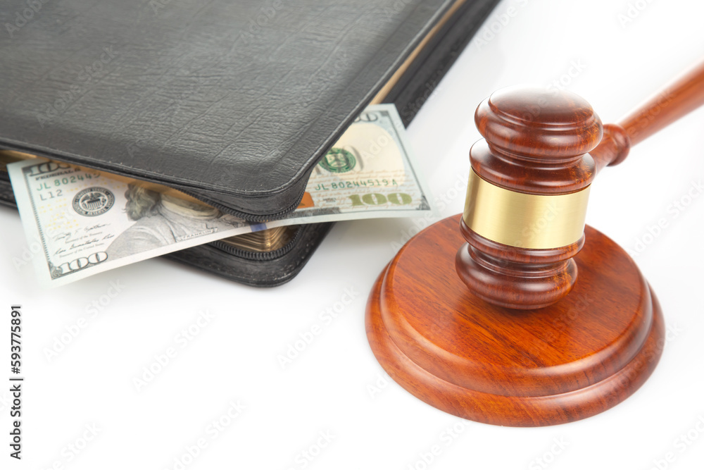 gavel of justice on the background of dollars. corruption in law. buying a judgment gavel of justice on the background of dollars. corruption in law. buying a judgment