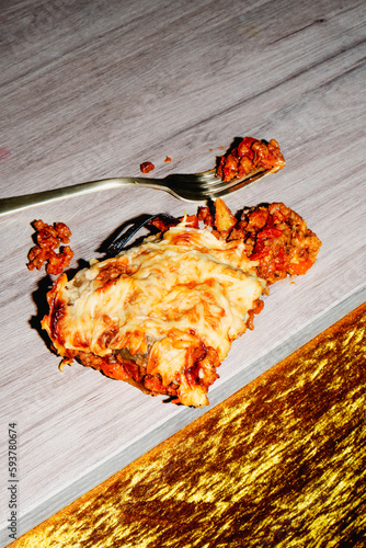 piece of moussaka on a table photo