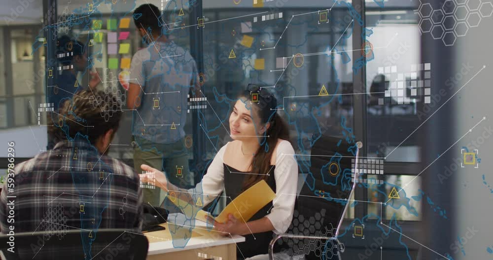 Animation of world map and data processing against diverse man and woman discussing at office Animation of world map and data processing against diverse man and woman discussing at office