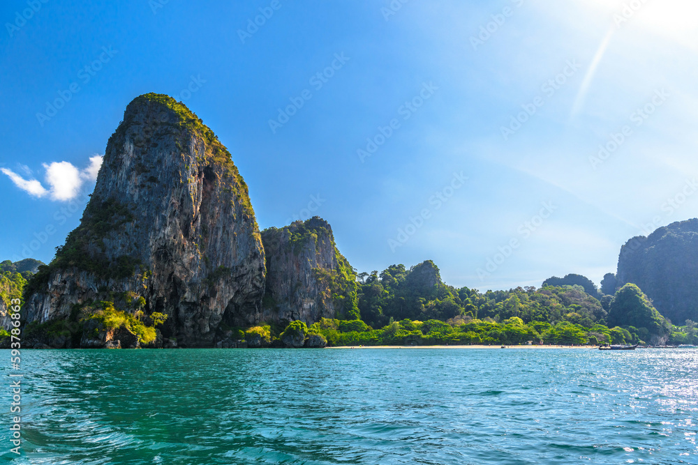Huge cliff rocks in azure water, Railay beach, Ao Nang, Krabi, Thailand