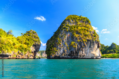 Huge cliff rock in azure water, Ko Rang Nok, Ao Phra Nang Beach, Ao Nang, Krabi, Thailand photo