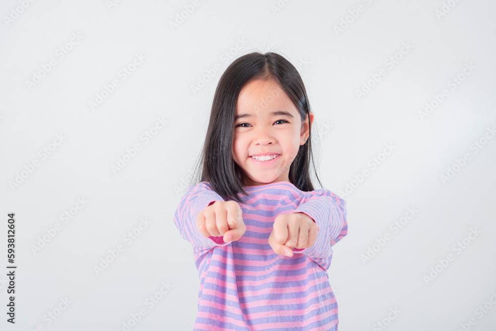 Image of Asian child posing on white background Image of Asian child posing on white background