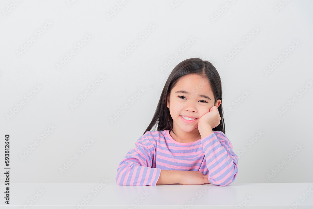 Image of Asian child posing on white background Image of Asian child posing on white background
