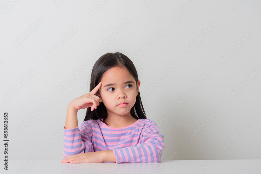 Image of Asian child posing on white background Image of Asian child posing on white background