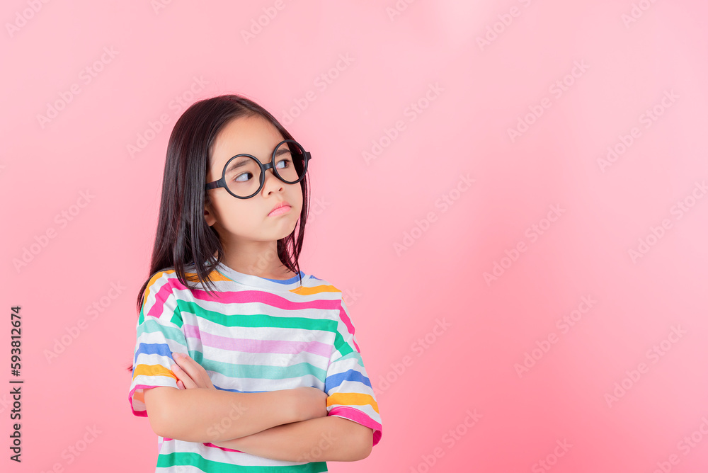Image of Asian child posing on Pink background Image of Asian child posing on Pink background